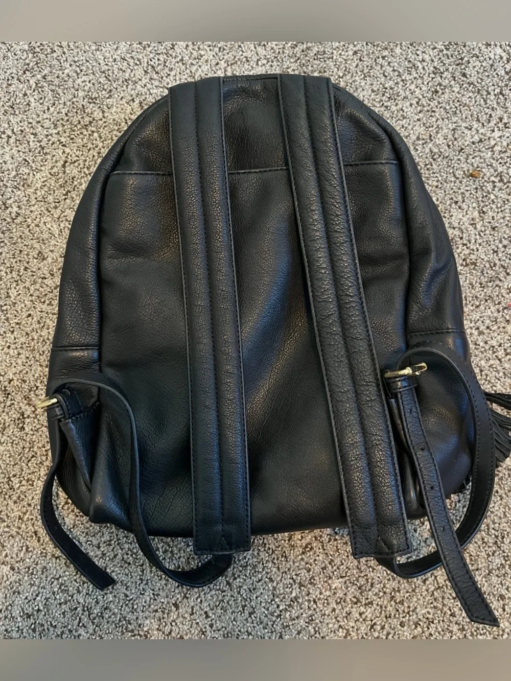 Margot black leather mini backpack with fringe tassel accent
